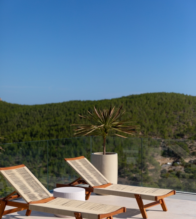 Resa Estates for sale Ibiza Vlla Aixa te koop sale lift sea views exterior day beds.jpg